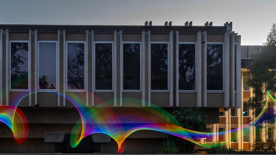 Birch building with rainbow